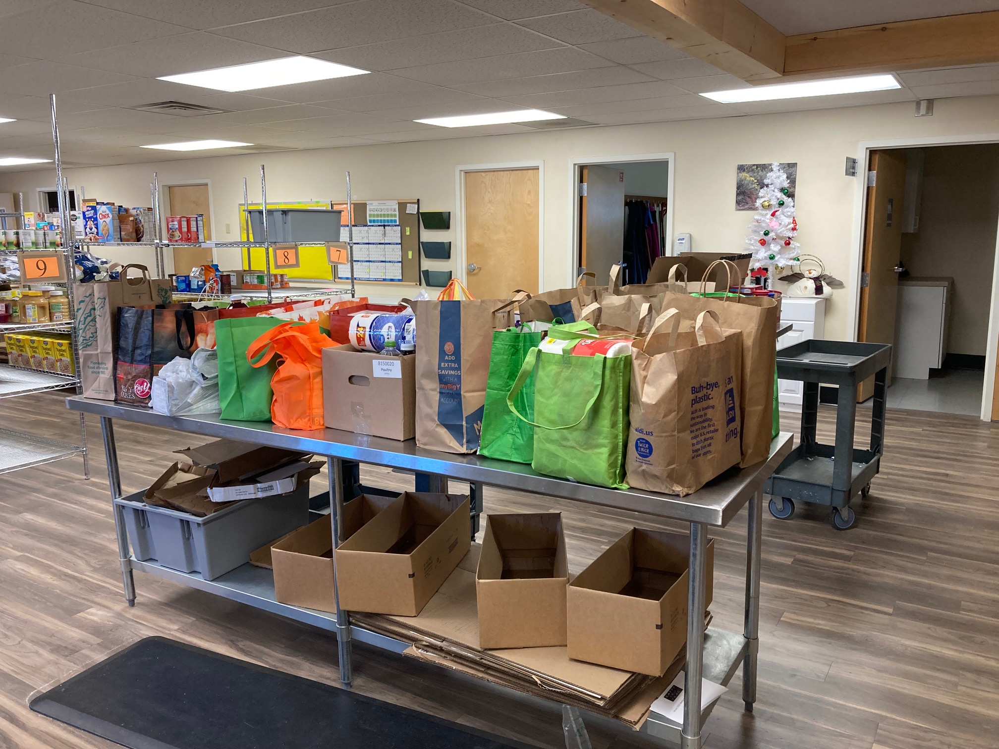 three photos of donations made by grace episcopal church to safe net Ministries