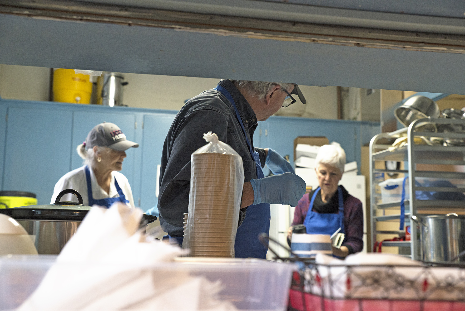 parishioners of grace episcopal church making food in the kitchen for the apple fest of 2023